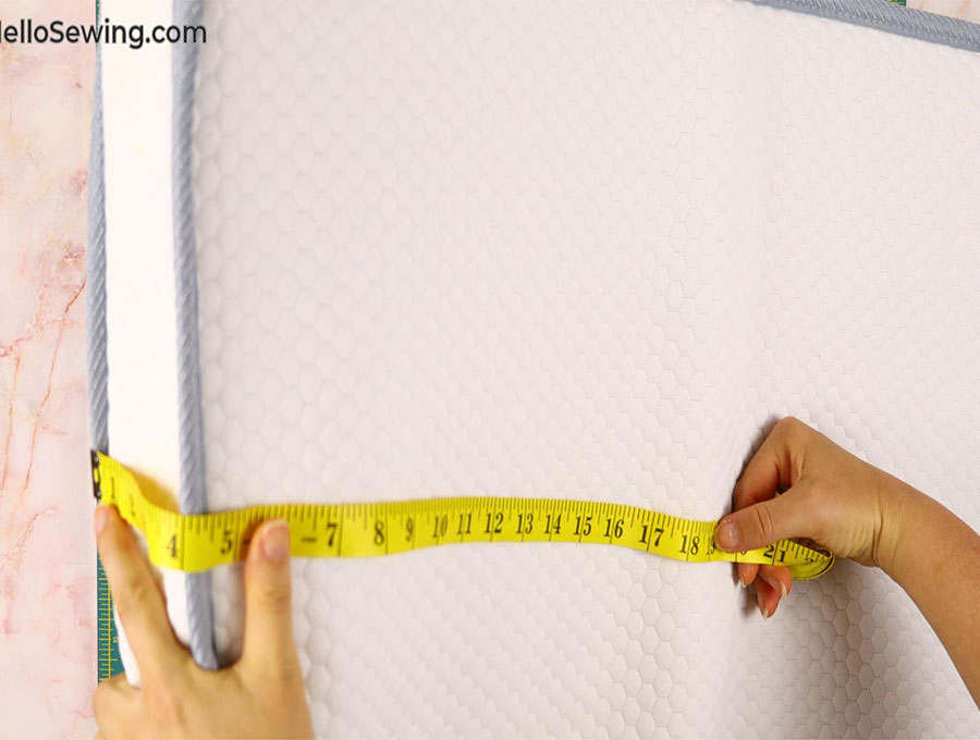 measuring the matress to make a diy fitted baby cot or crib sheet