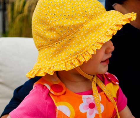 Free baby bonnet with ruffles and ties