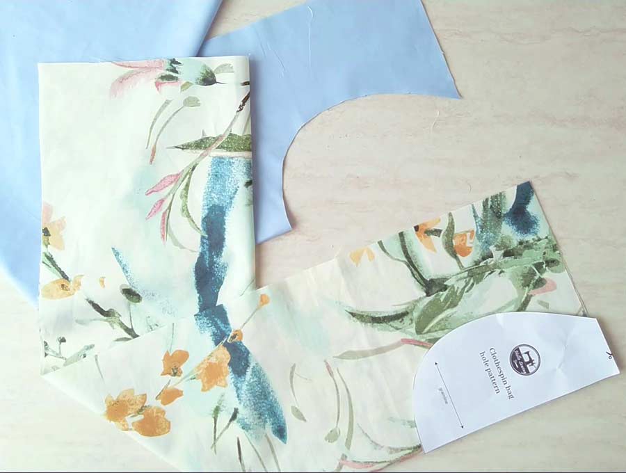 cutting out the clothesline bag pattern out of both fabrics