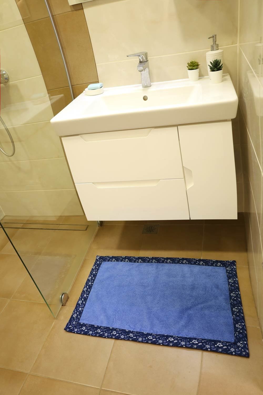 diy bath mat in front of door