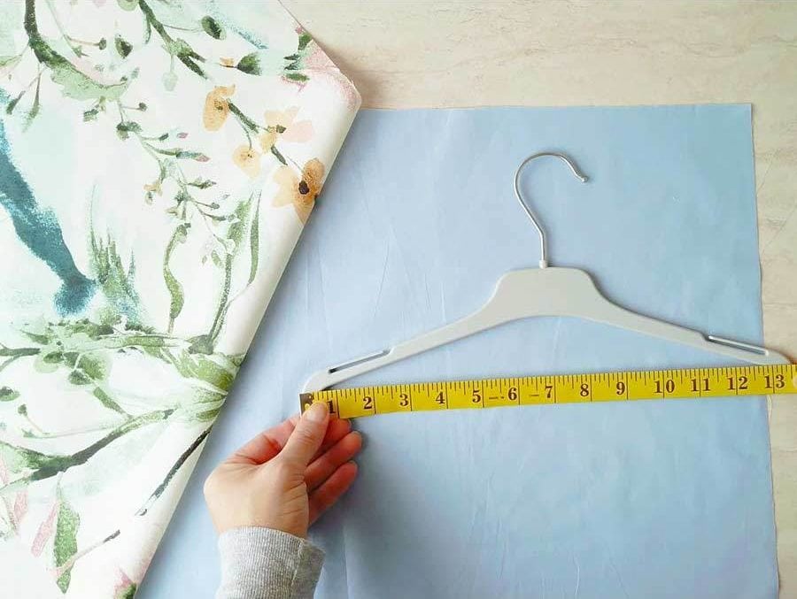 measuring the hanger to sew the clothespin bag