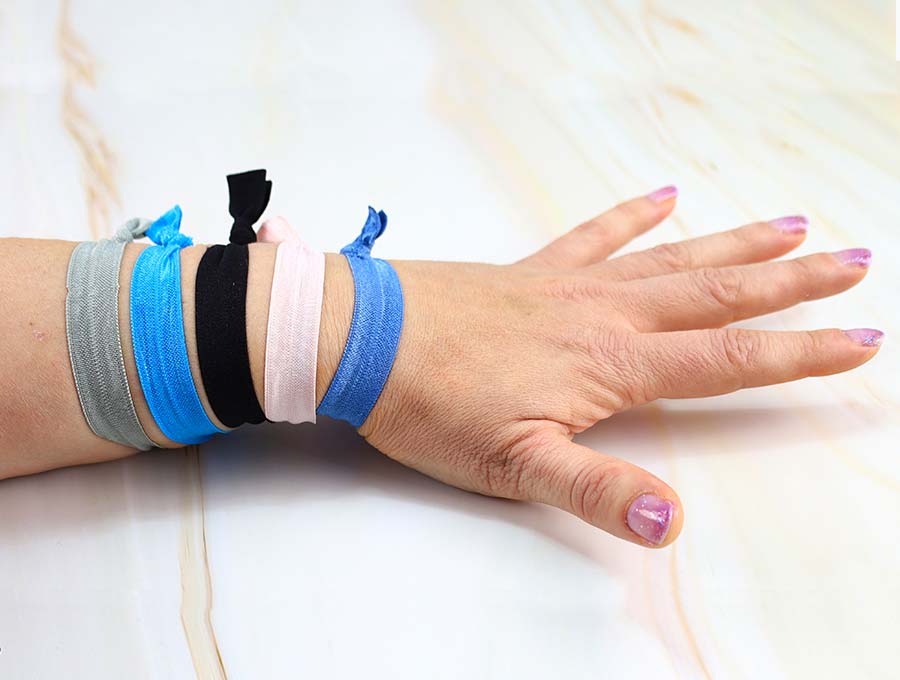 diy elastic hair ties on a hand