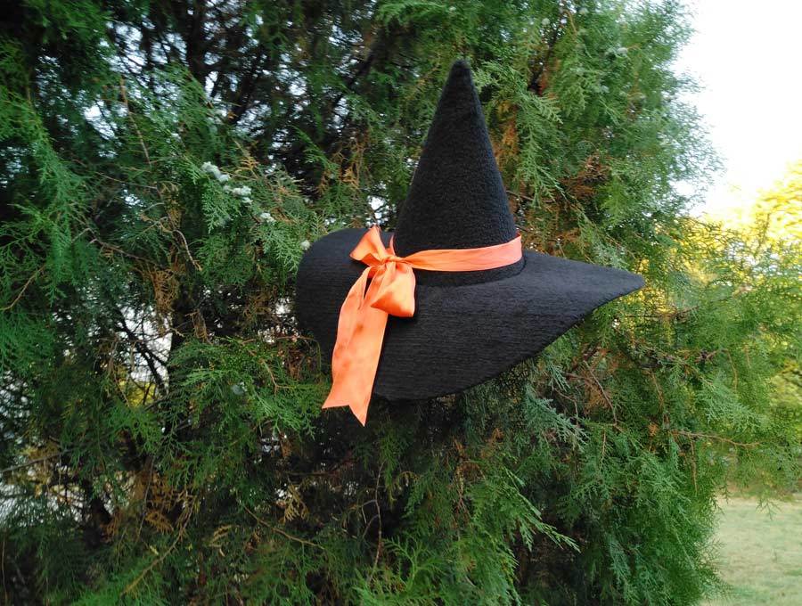 finished diy witch hat hanged on a tree