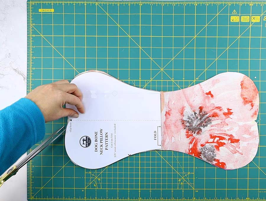 making the v cuts according to the dog bone pillow template