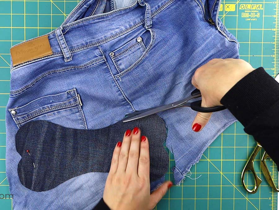 cutting out the dog bone pattern out of jeans