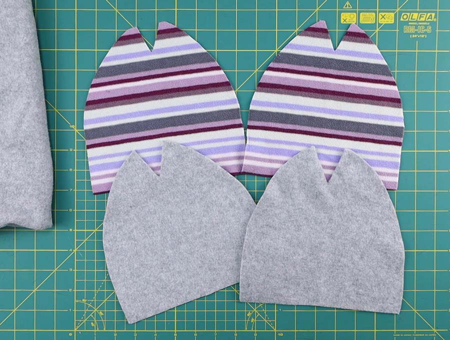 fleece hat pieces cut according to the free pattern