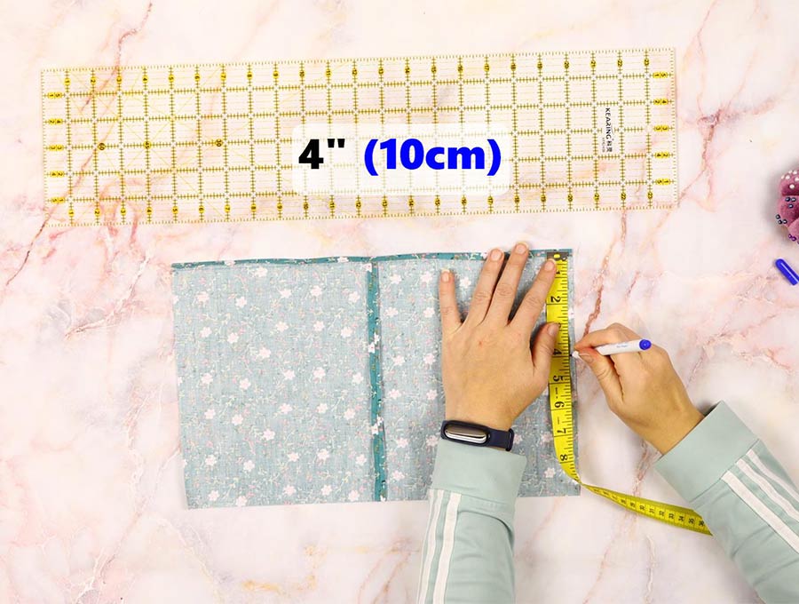 measuring 4" from the top of the fabric gift bag