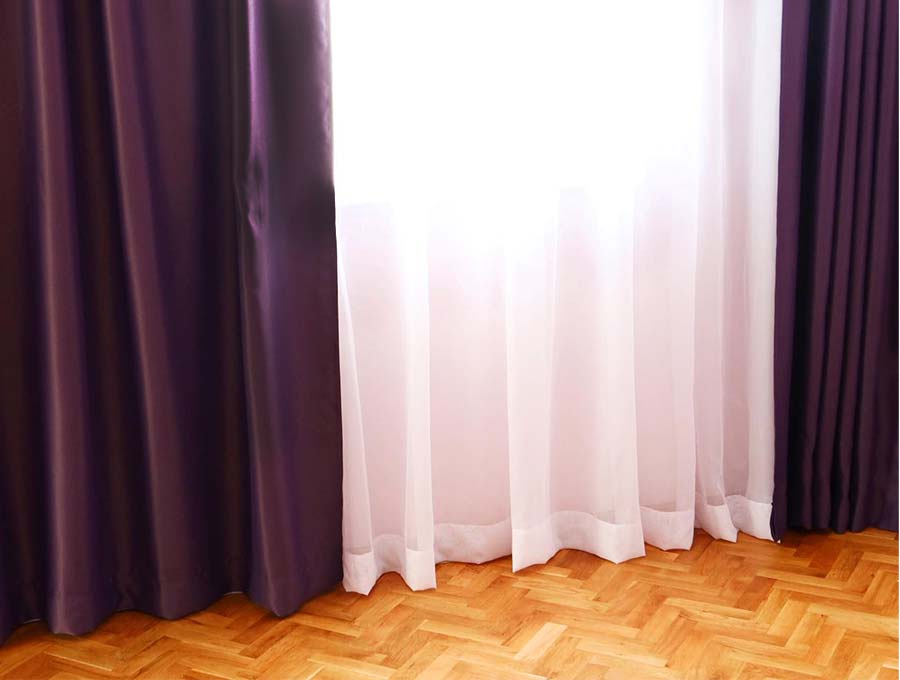 how to hem curtains - finished curtains on a track