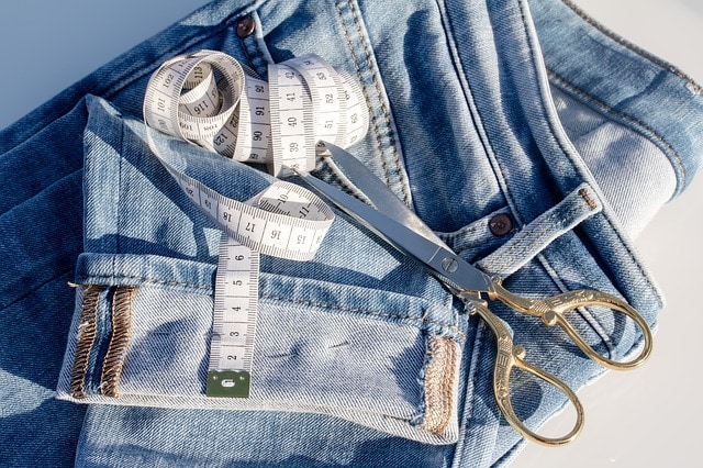 A Pile Of Different Types Of Blue Denim Jeans Closeup Showing Texture Stock  Photo, Picture and Royalty Free Image. Image 9779864.