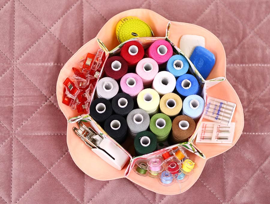 multi compartment organizer in use -stacked with sewing supplies