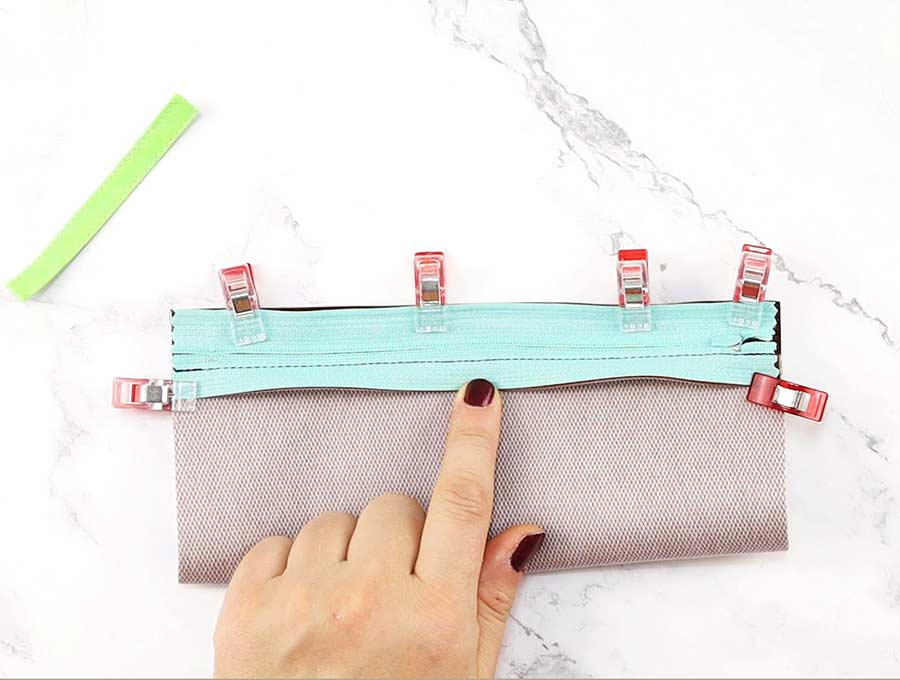 pin the zipper to the homemade pencil pouch