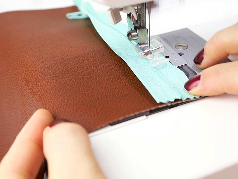 sewing the zipper of the pencil case