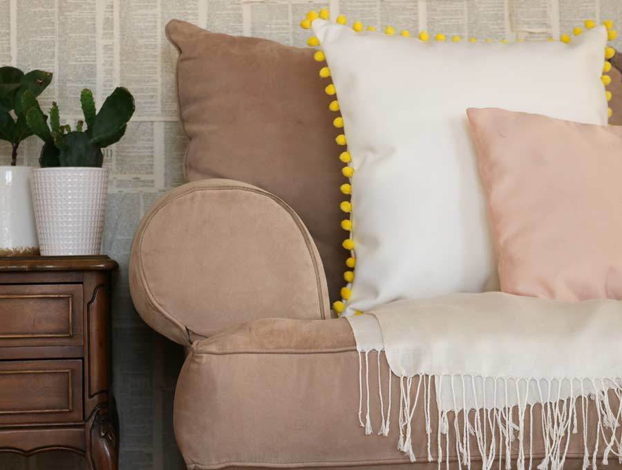 pom pom leather throw pillow