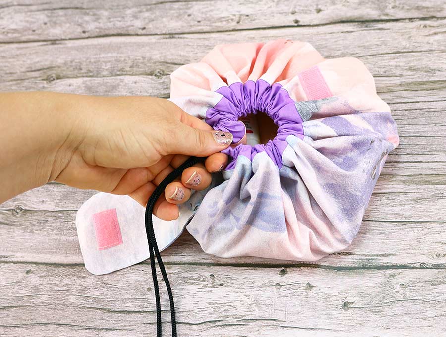 pull the drawstring to cinch up the diy makeup bag