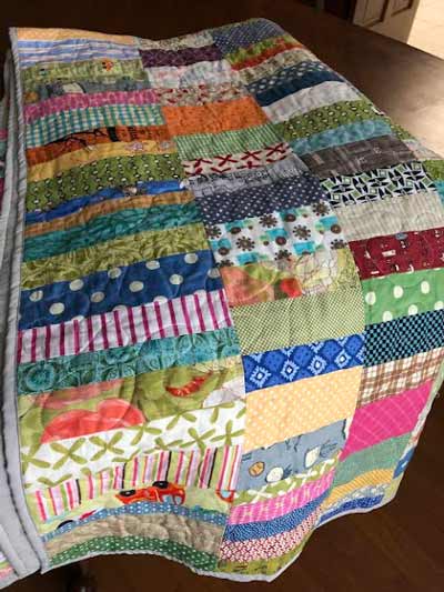 Scrappy strip quilt