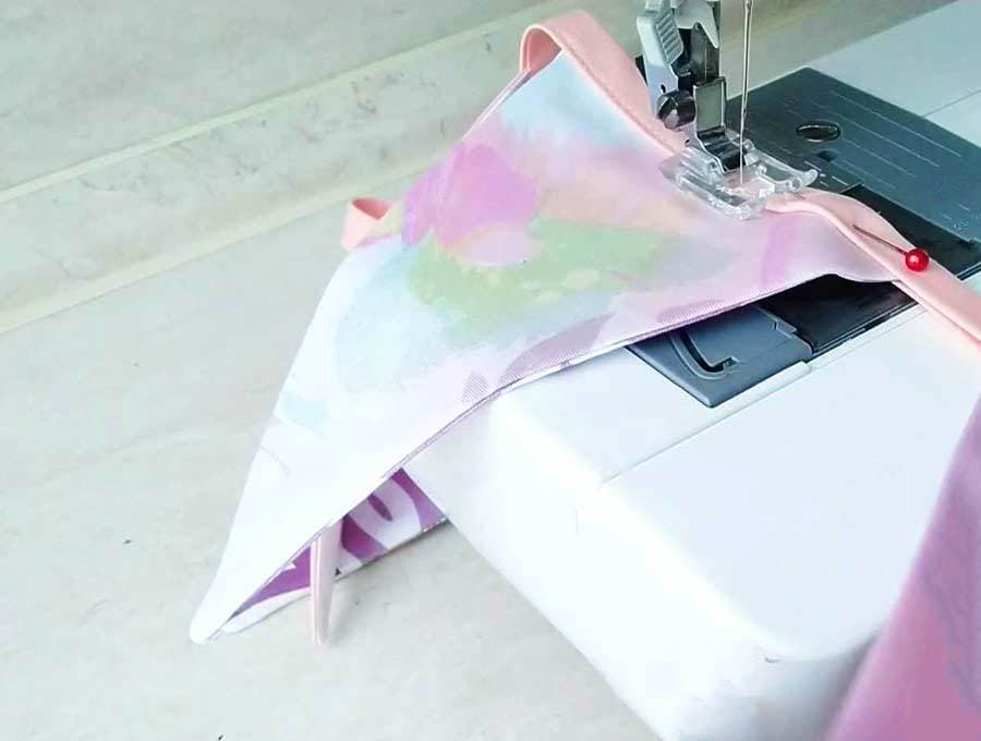 sewing bunting flags to tape