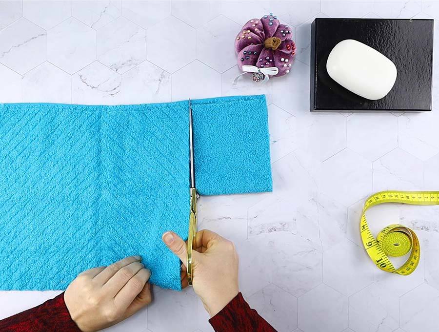 cutting washcloth to make soap holder pouch