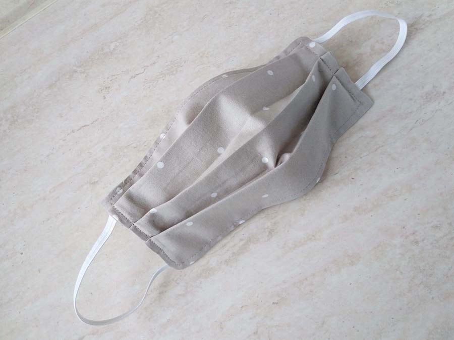 surgical facemask with pleats open