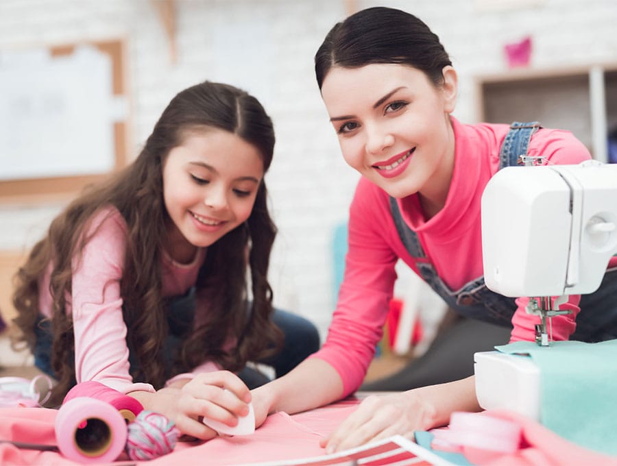 teaching a girl to sew