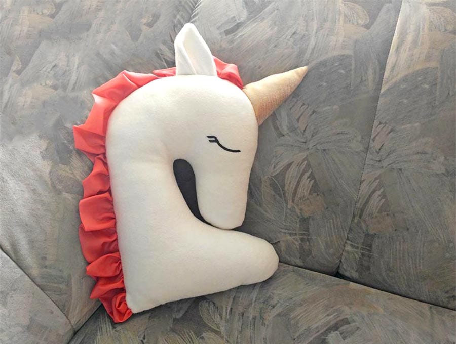 diy unicorn pillow on couch